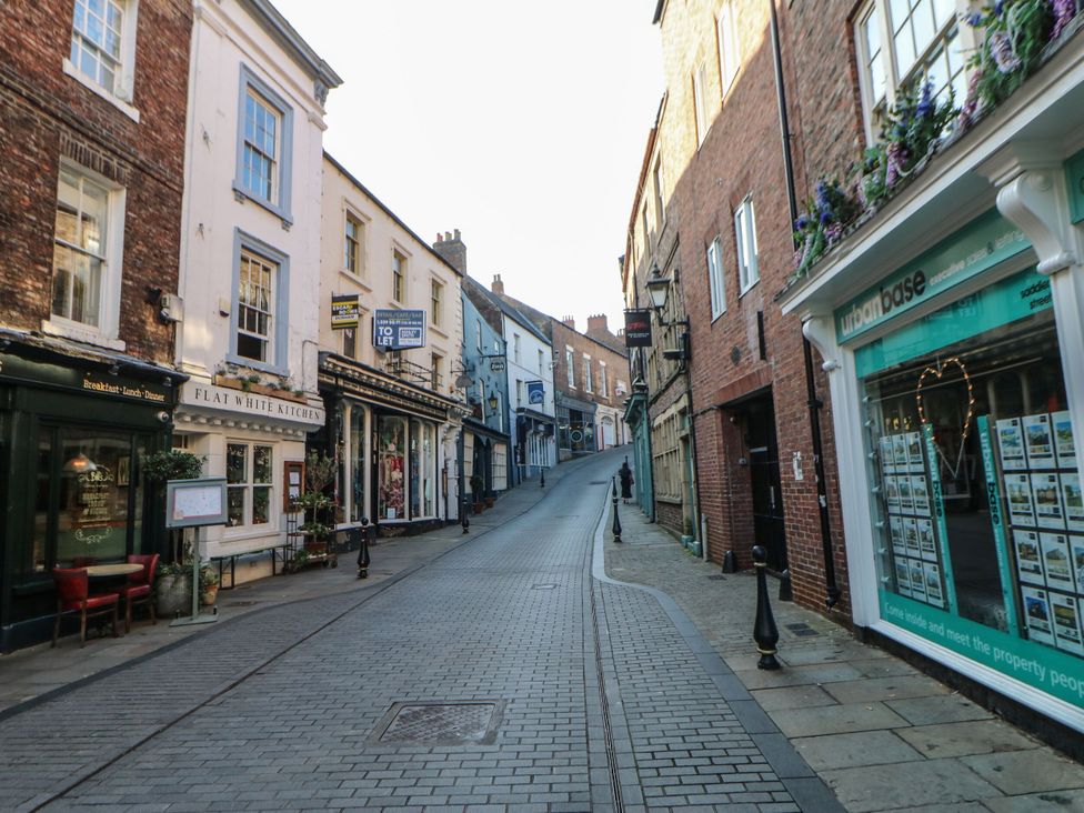 A street view with shops and buildings at Antoninus Barn 2 in Ebchester