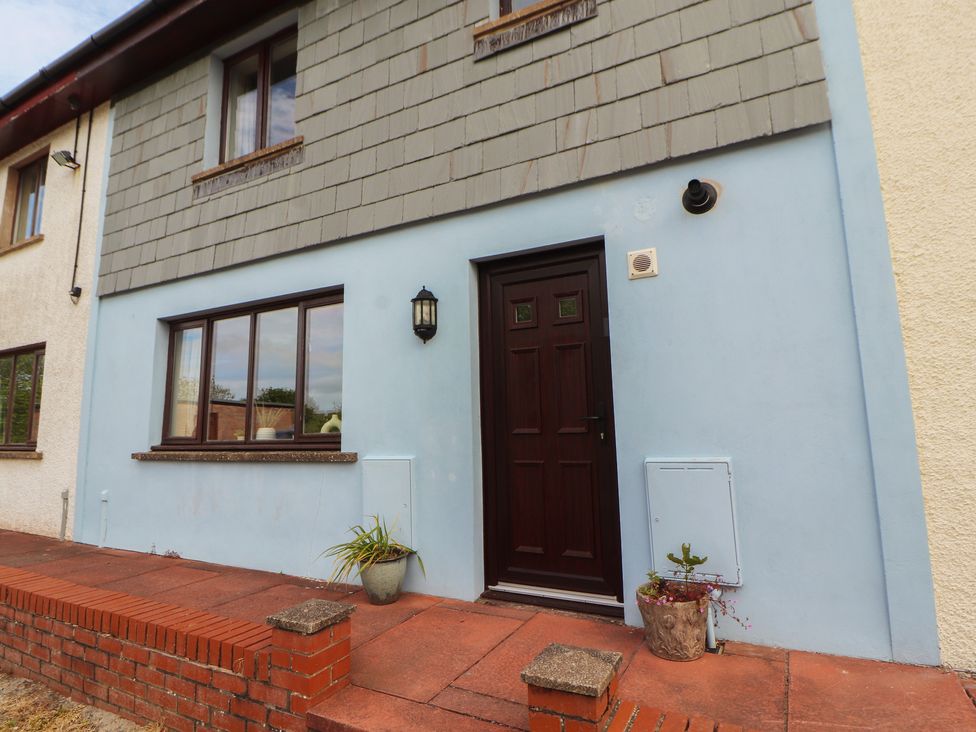 A front entrance with a door and windows at Valley View in Cleator Moor