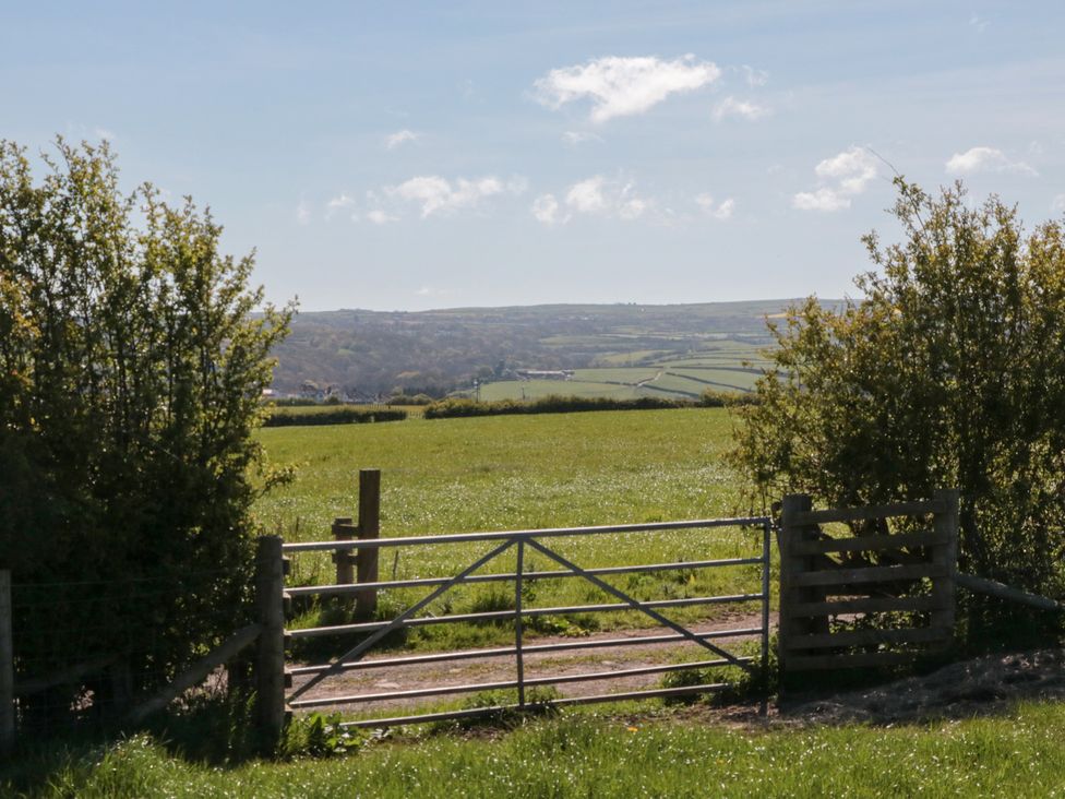 A gate opening to a field at Magnolia Lodge in Whitby