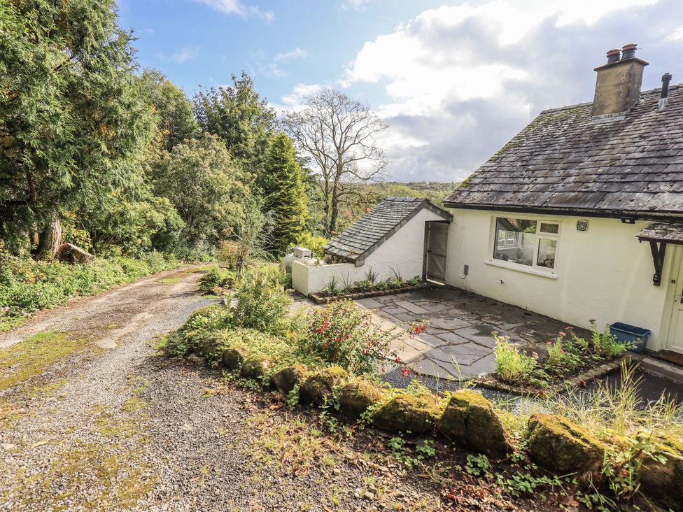 An outdoor view of a house and driveway at Tethers End in Lindeth near Bowness-On-Windermere