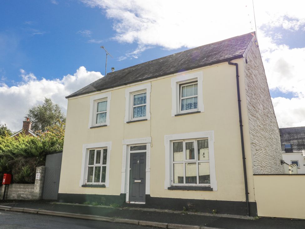 A house with windows and a door at Station Hall in Cilgerran