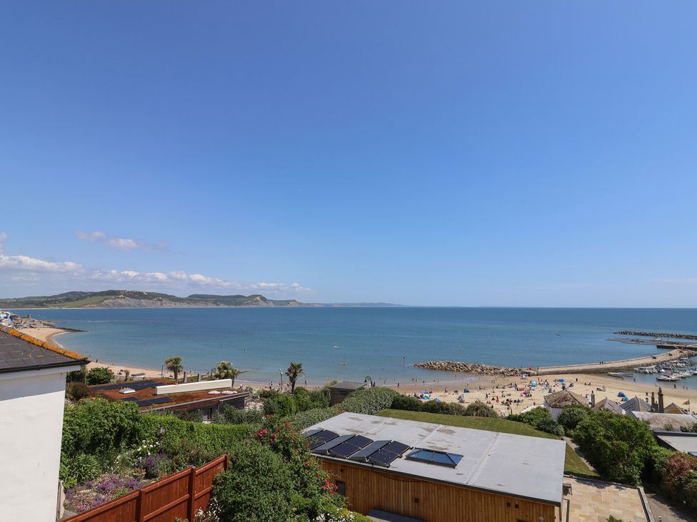 A view of the beach and sea at 3 Harbour Heights in Lyme Regis