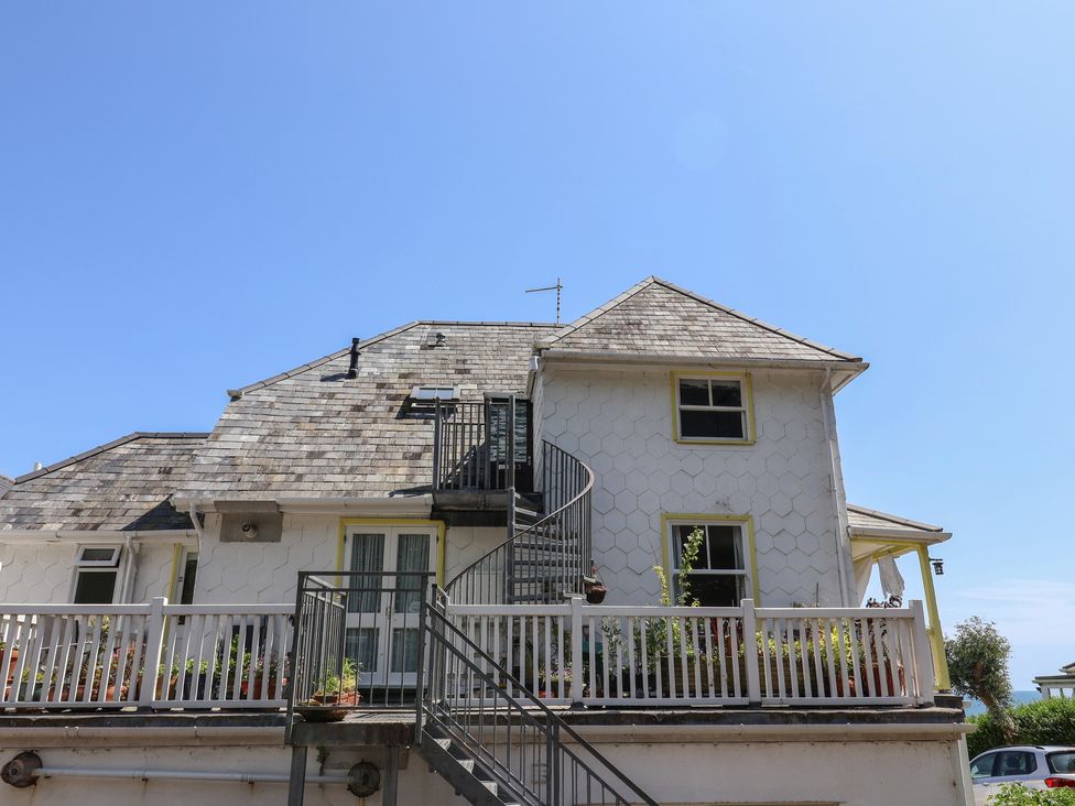 A house with a staircase and balcony at 3 Harbour Heights Lyme Regis