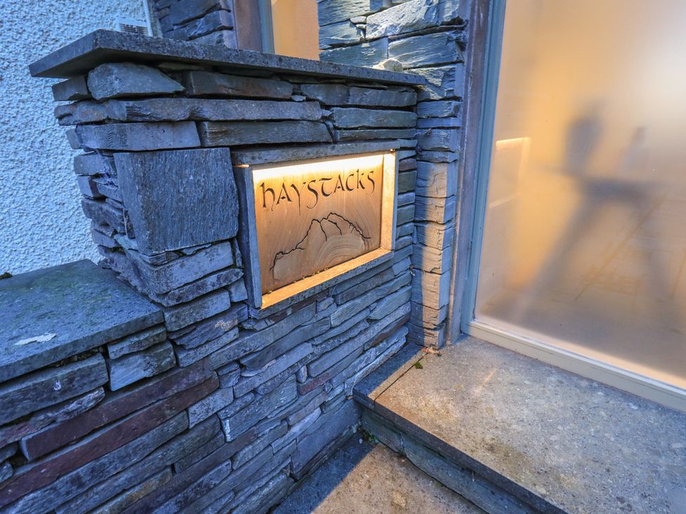 An entrance sign for Haystacks at Troutbeck