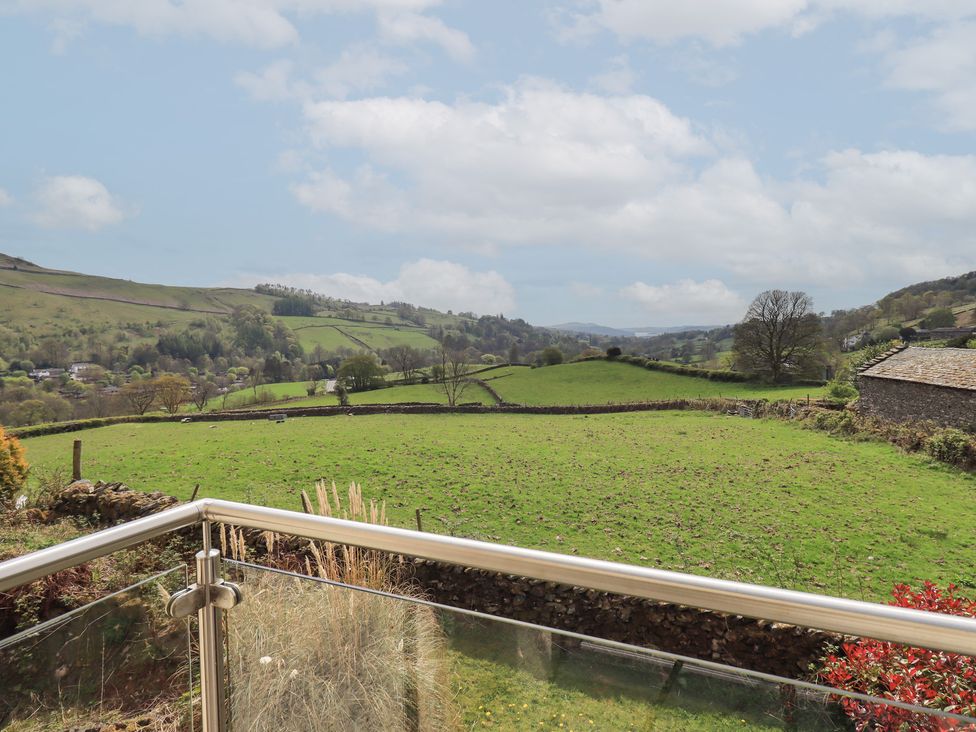 A view of rolling green hills at Haystacks in Troutbeck