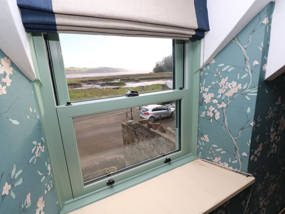 A window with a view of the outdoors at 2 Strand Cottages in Carmarthen