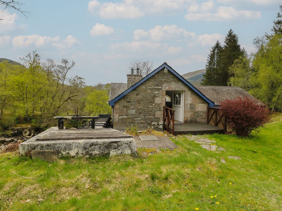 A building with a deck and bench in an outdoor area at Culearn Mill, Balquhidder, Perthshire, Scotland