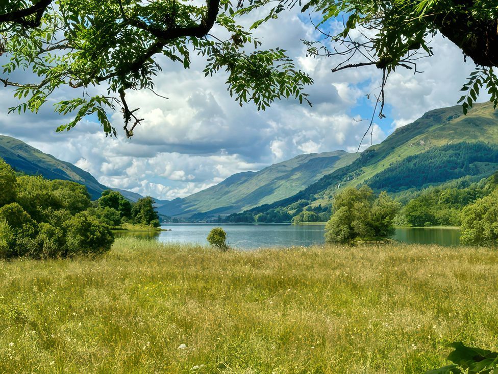 A landscape with a lake and mountains at Culearn Mill, Balquhidder, Perthshire, Scotland
