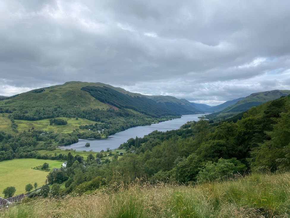 A view of a lake and mountains at Culearn Mill, Balquhidder, Perthshire, Scotland