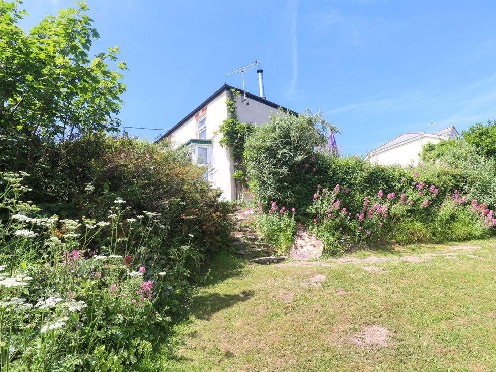 A house with a garden and steps at Greenways in Perranporth
