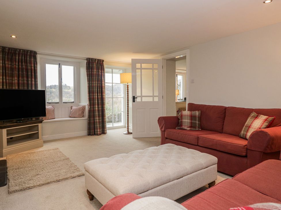 A living room with sofa and television at Brockstones Grasmere