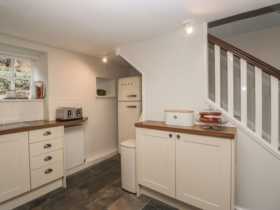 A kitchen with appliances and storage at Brockstones Grasmere