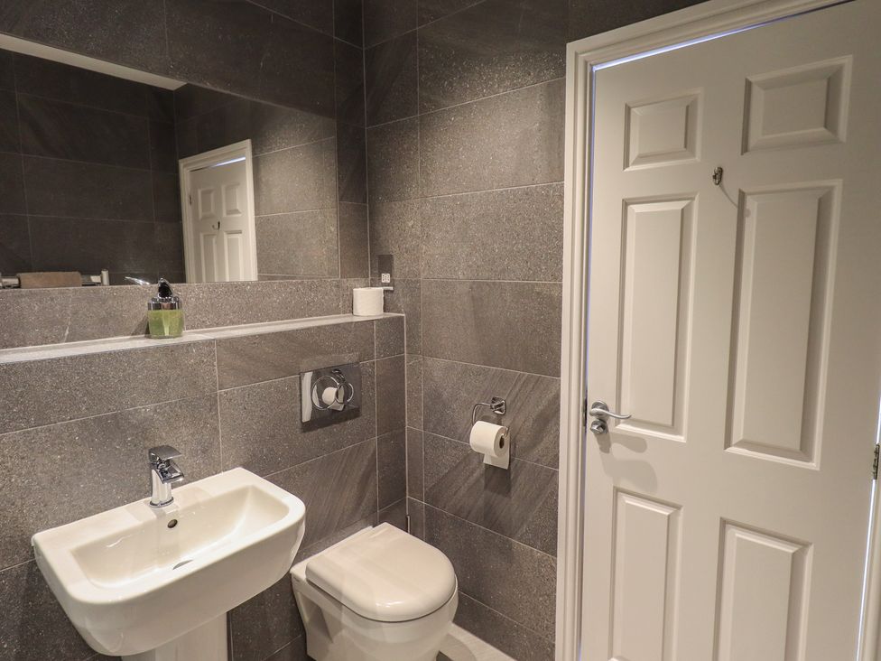 A bathroom with a sink and toilet at Waterfall in Ambleside