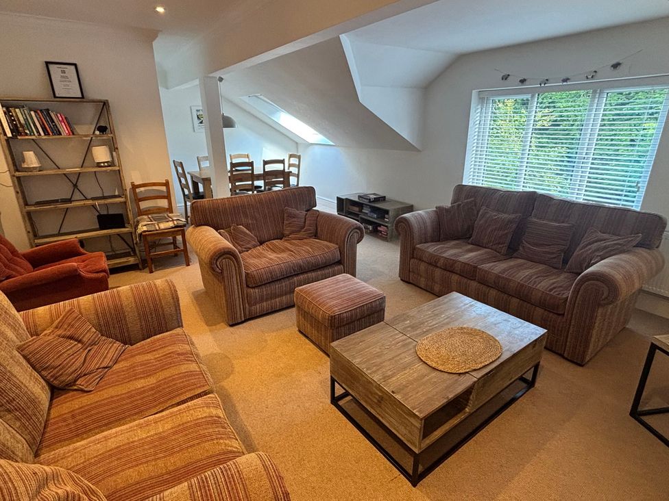 A living room with sofas and a coffee table at Waterfall in Ambleside