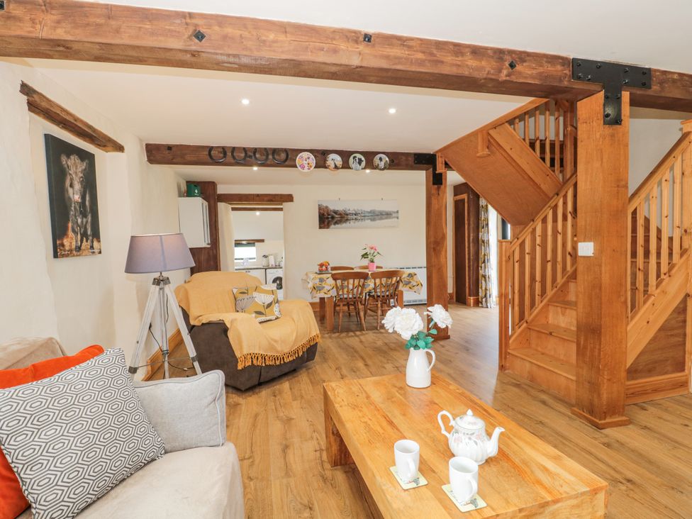 A living room with a sofa and coffee table at The Bull Pen in Yeovil, Somerset