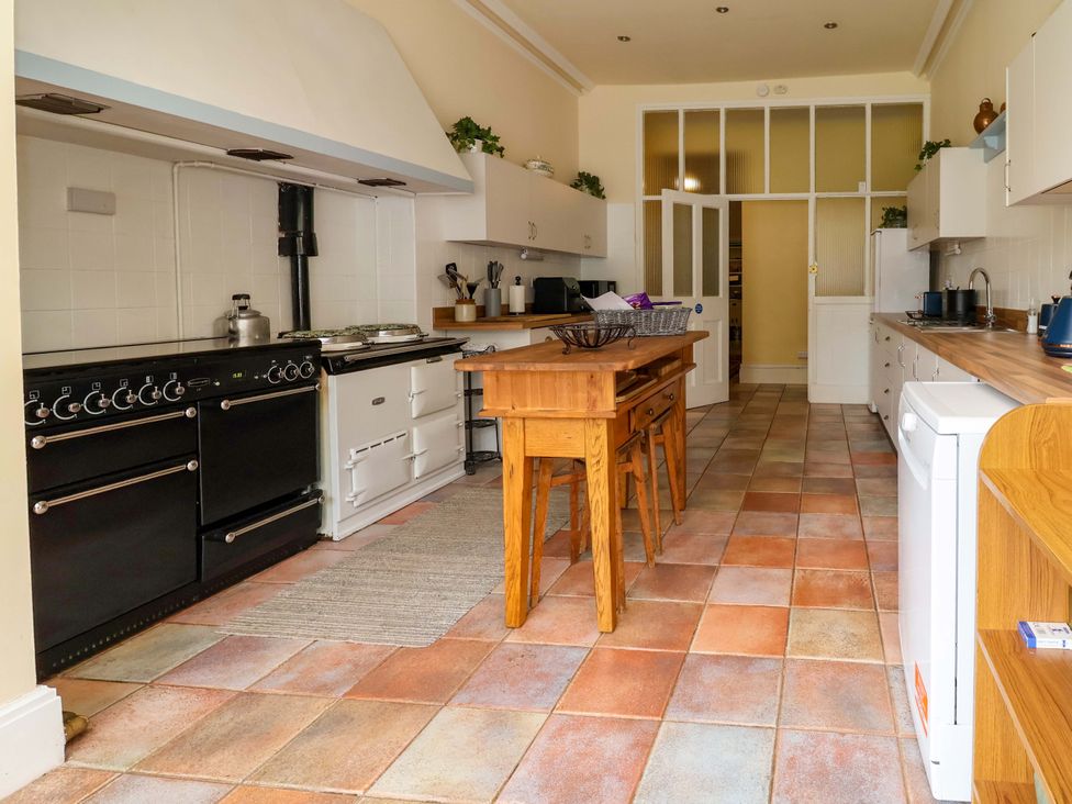 A kitchen with a table and chairs at Parkfields House Tittensor near Barlaston