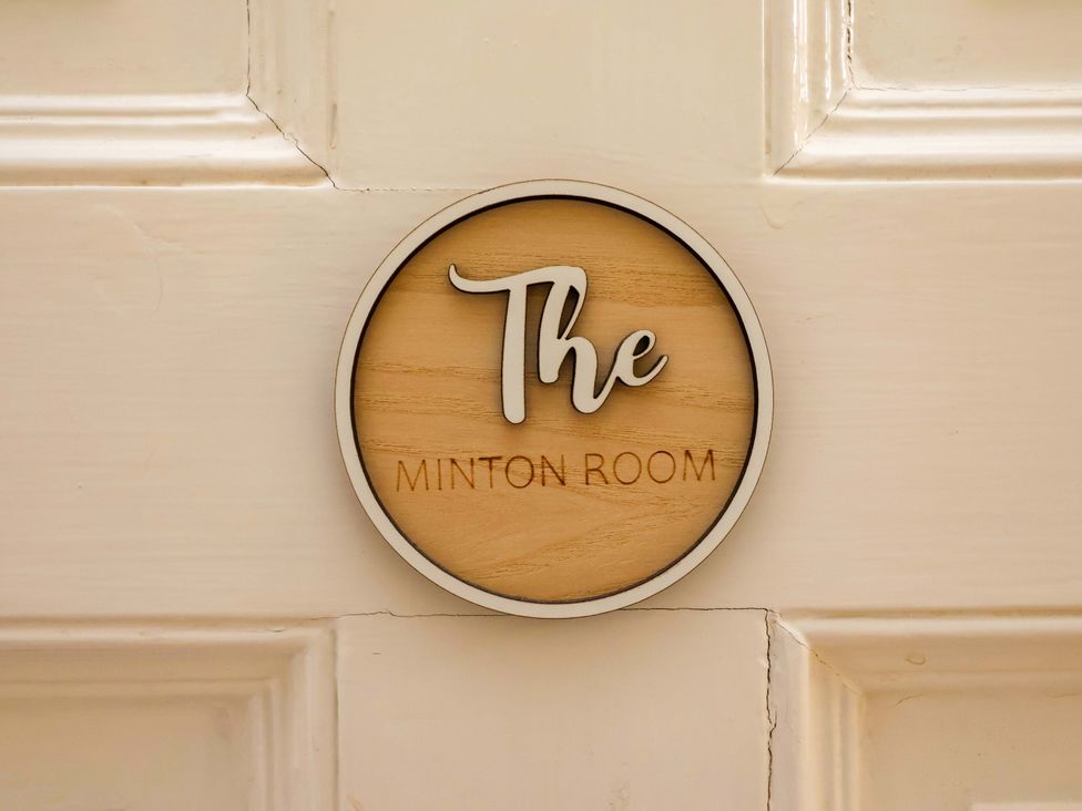 A nameplate on a door labeled The Minton Room at Parkfields House Tittensor near Barlaston