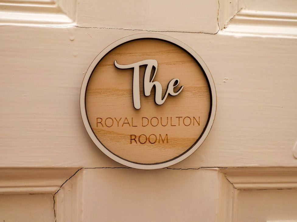 A room sign indicating the Royal Doulton Room at Parkfields House Tittensor near Barlaston