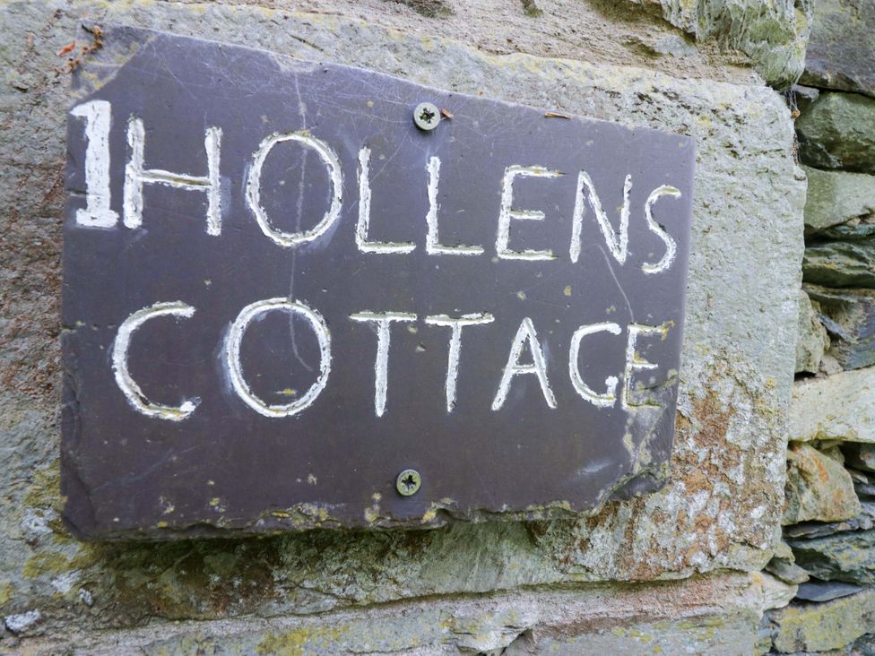 A sign for Hollens Cottage at Grasmere
