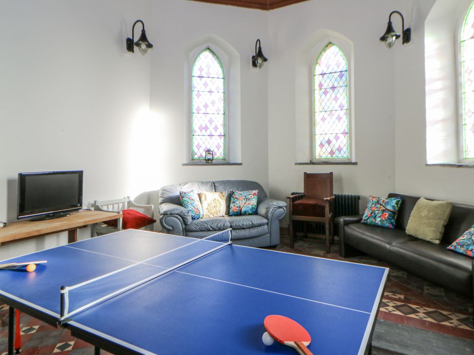 A recreation room with a table tennis table at Church Llygad Y Dyffryn in Sarnau near Brynhoffnant
