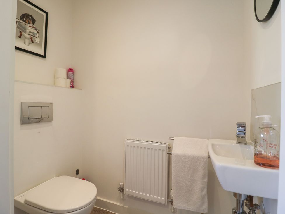 A bathroom with toilet and sink at Inishnee House in Shotley Gate