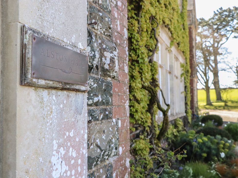 A nameplate on a wall at Alston Hall near Mothecombe Beach