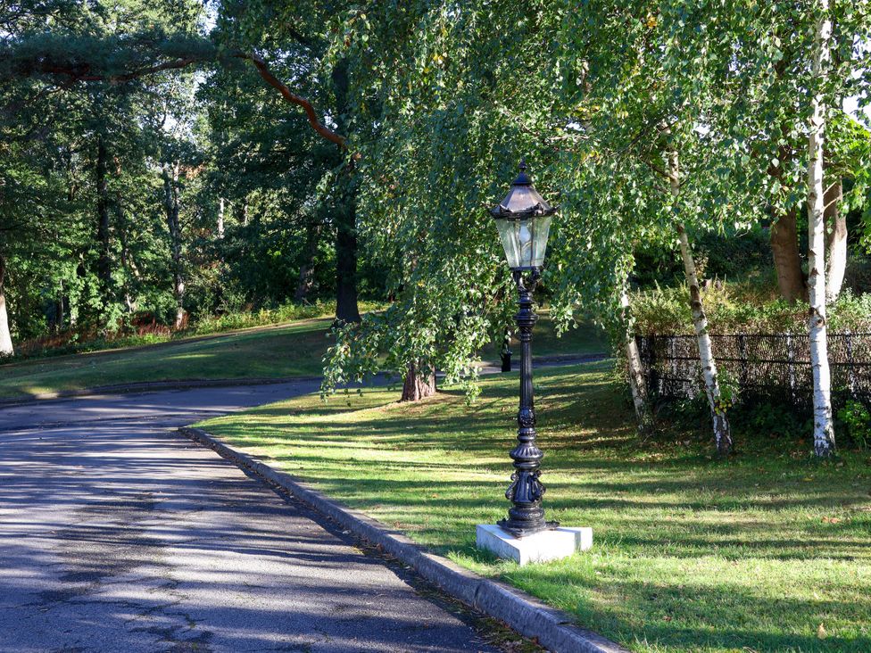 A lamp post beside a road in a park at Cowslip Saltburn-By-The-Sea