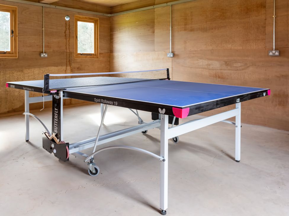 A table tennis table in an indoor recreation room at Johnsons Smallholding, Market Drayton