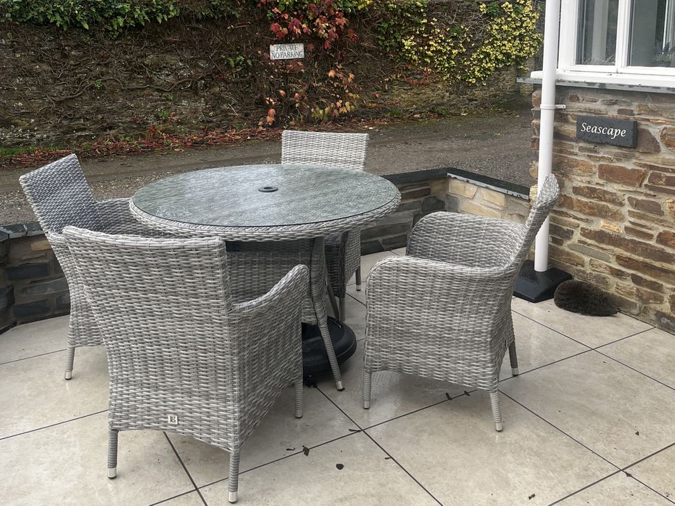 A table with chairs at Seascape in Kingsand