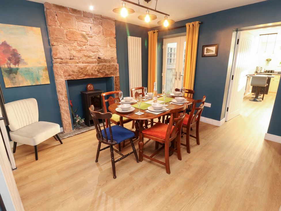 A dining room with a table and chairs at 10 Keekle Terrace in Keekle near Cleator Moor