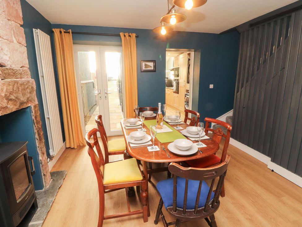 A dining room with a table and chairs at 10 Keekle Terrace in Keekle near Cleator Moor