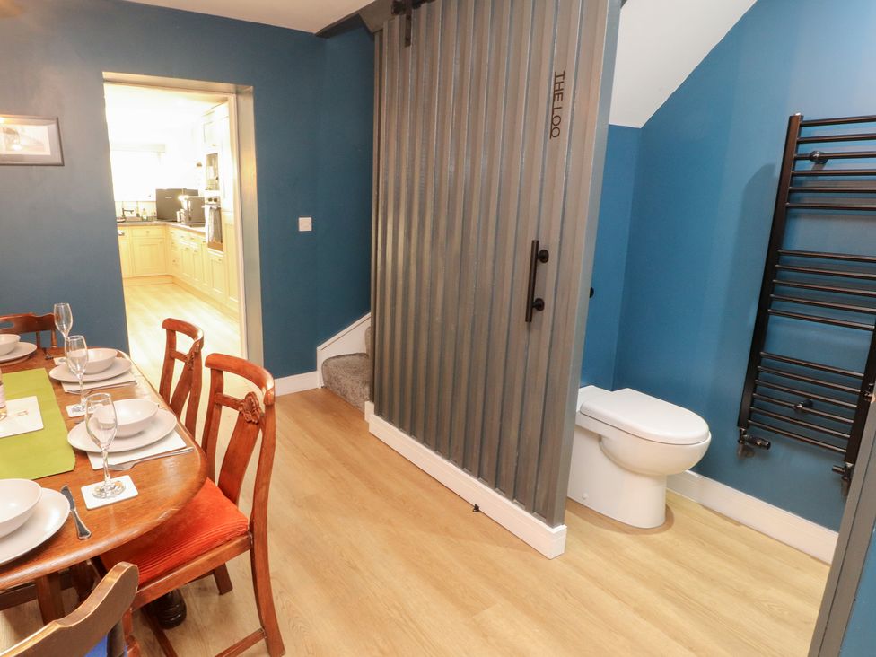 A dining room with a table and chairs at 10 Keekle Terrace in Keekle near Cleator Moor
