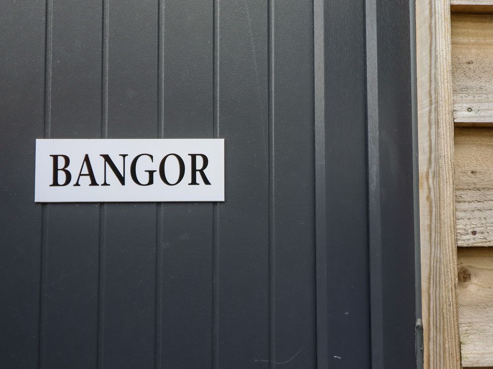 A door with a nameplate reading Bangor at Bangor in Knolton near Ellesmere