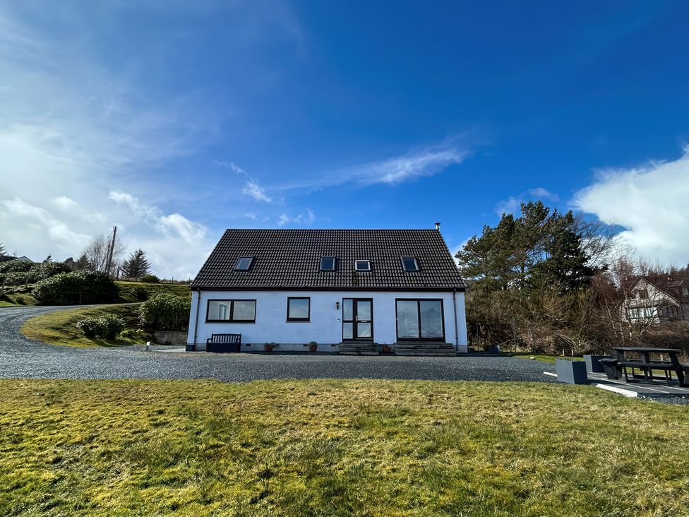 A house with a garden and driveway at Calmdale Inverasdale near Poolewe