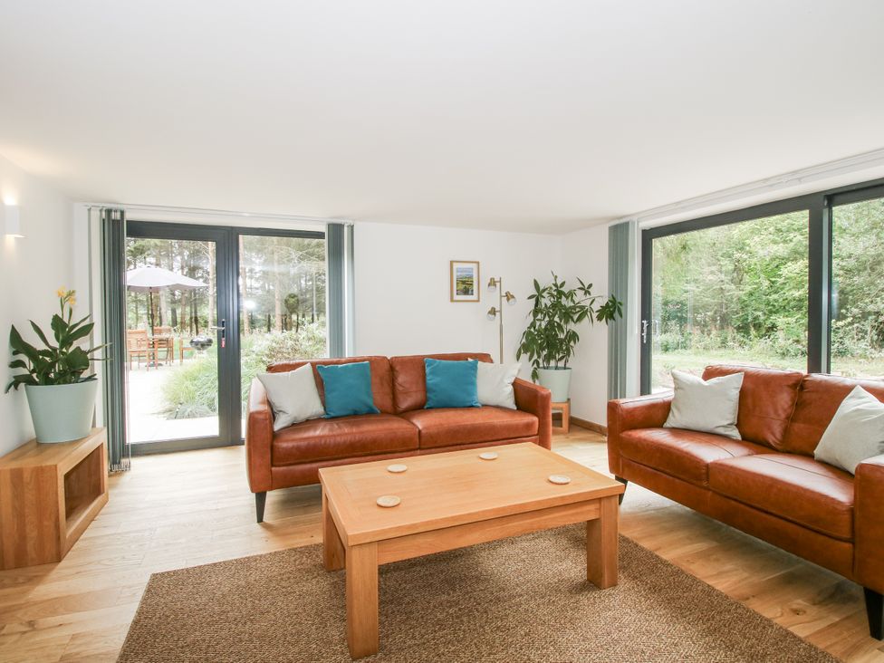 A living room with couches and a coffee table at The Barn in Acton near Bishop's Castle