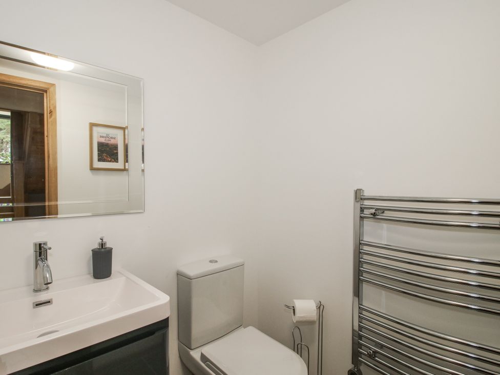 A bathroom with sink and toilet at The Barn in Acton near Bishop's Castle