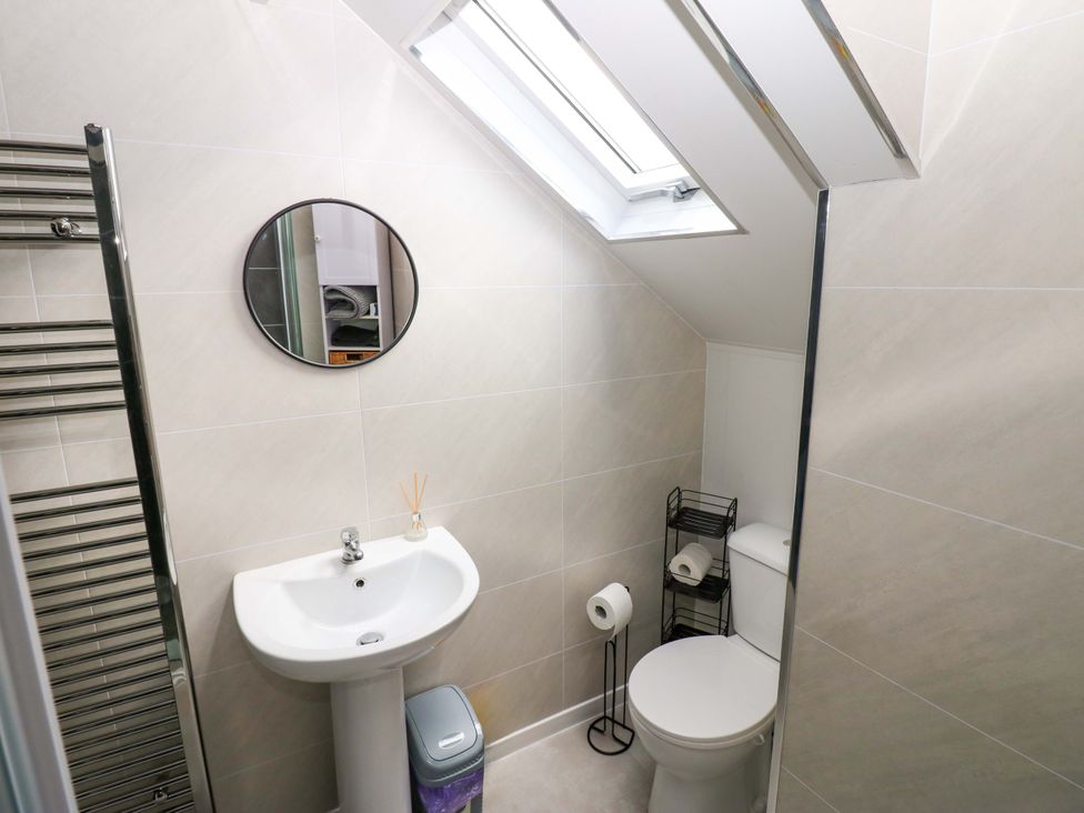 A bathroom with sink and toilet at 8 Percy Terrace in Whitburn