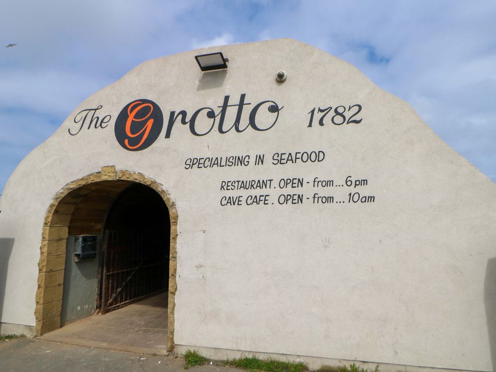 An entrance to The Grotto seafood restaurant at 1782 in Whitburn