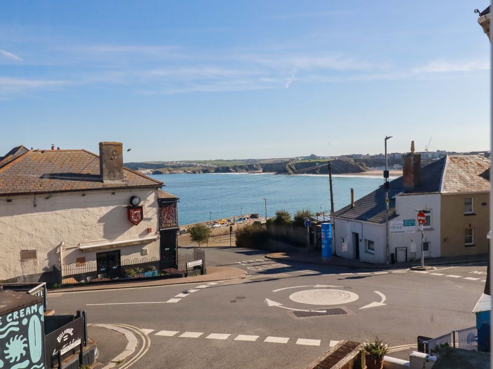 A coastal view with houses and a roundabout at Beach View House Newquay