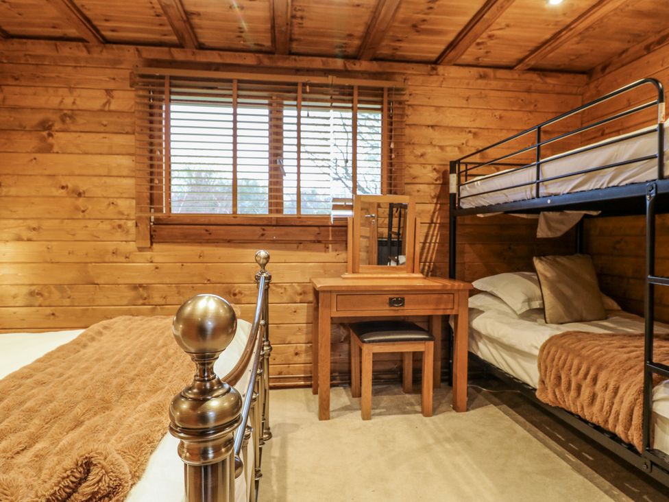 A bedroom with a bed and bunk bed at Rabbit Hole near Stamford