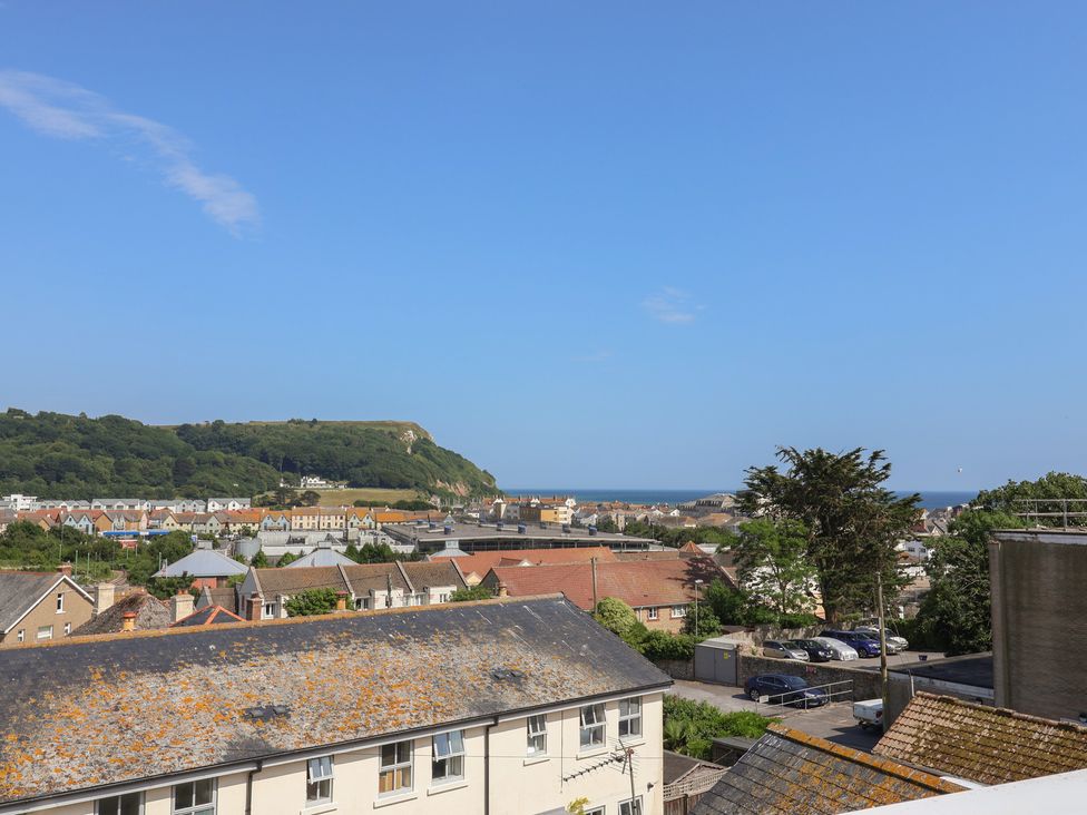 A view of the sea and hills from Cliff View in Seaton