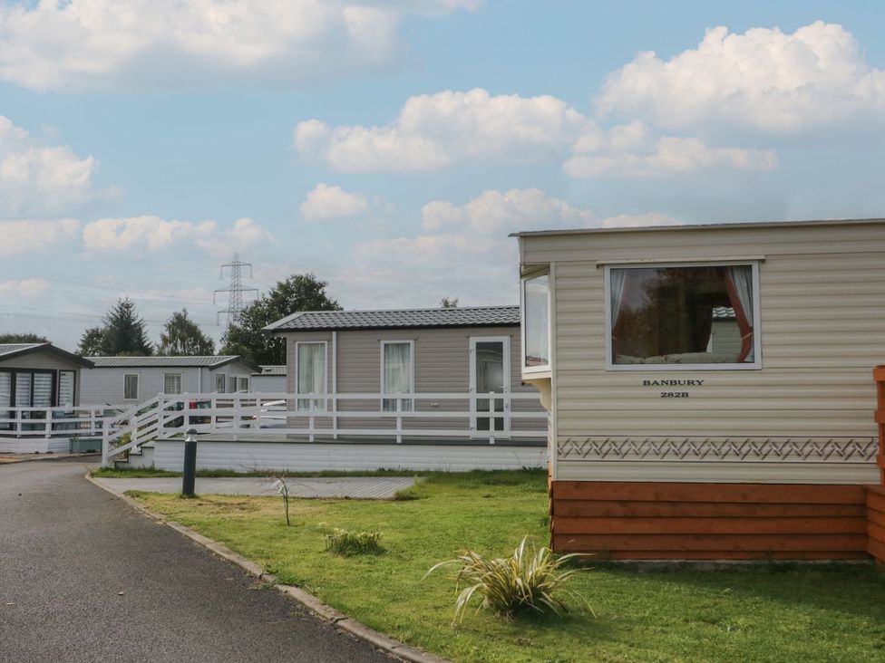 Caravans along a pathway at Yew in Denny