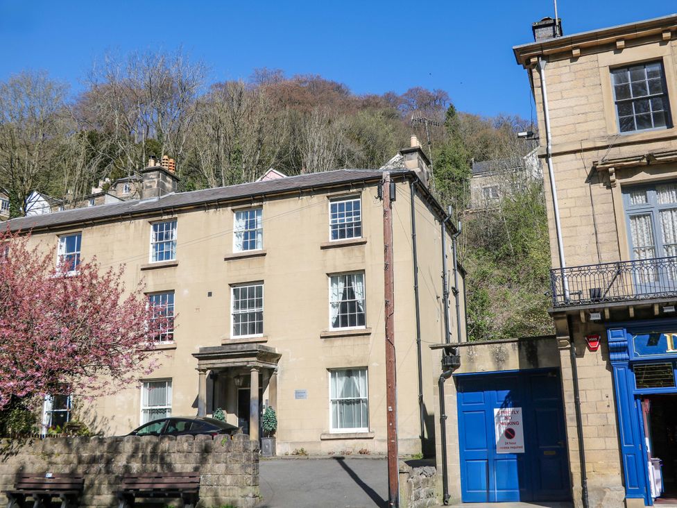 A house with windows and trees at Lumsdale Matlock Bath