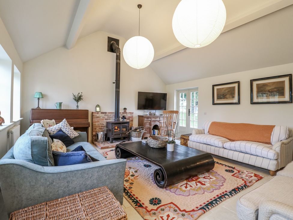 A living room with a sofa and coffee table at Gapstile in Abbots Bromley