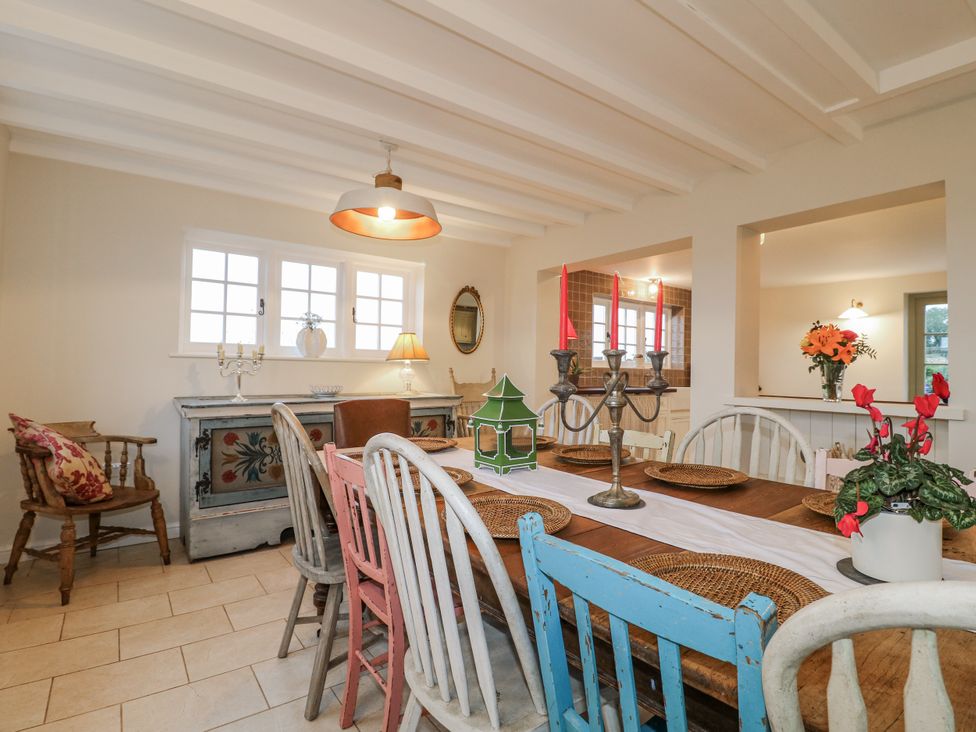 A dining room with a table and chairs at Gapstile in Abbots Bromley