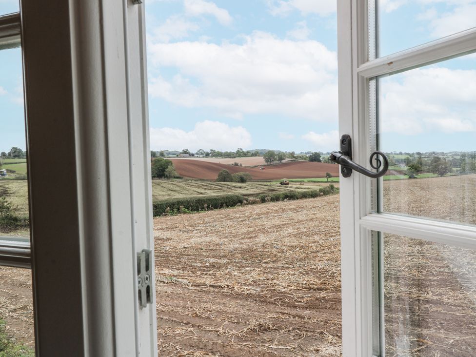 A view of fields from an open window at Gapstile in Abbots Bromley