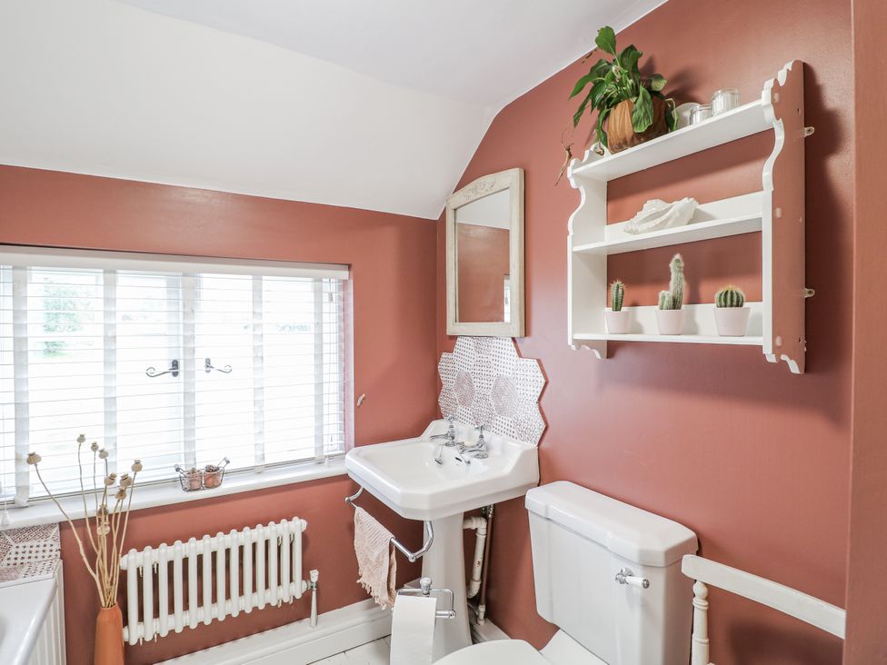 A bathroom with a sink and toilet at Gapstile in Abbots Bromley
