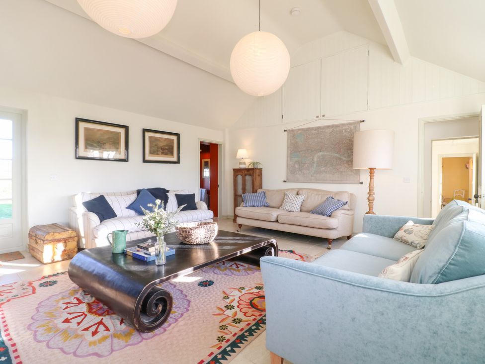 A living room with sofas and a coffee table at Gapstile in Abbots Bromley