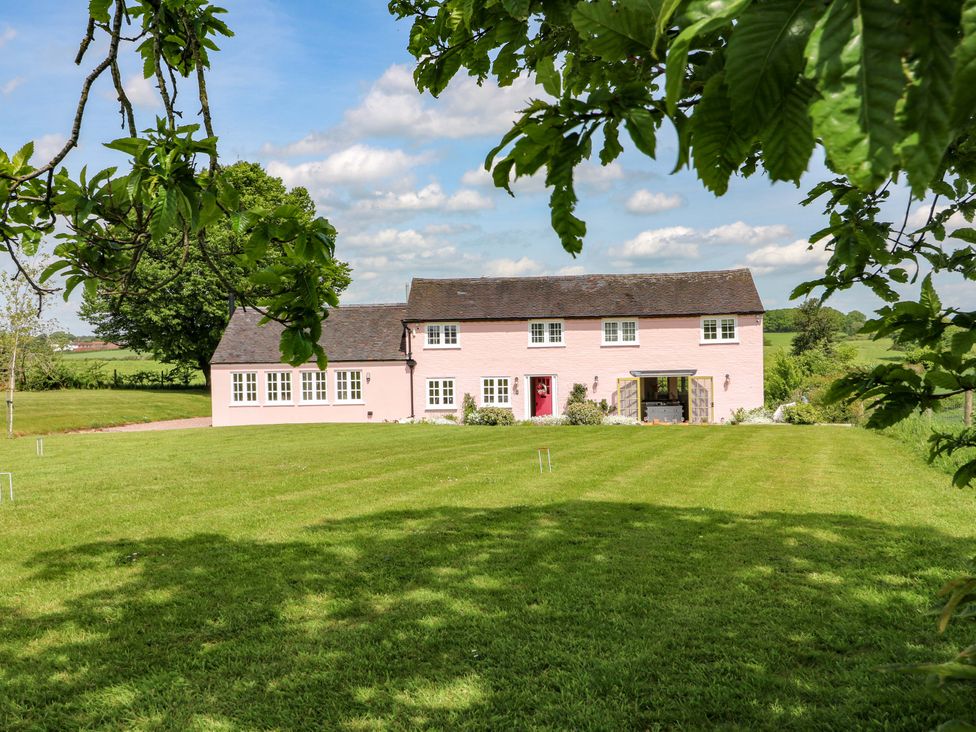 A house with a garden and trees at Gapstile in Abbots Bromley