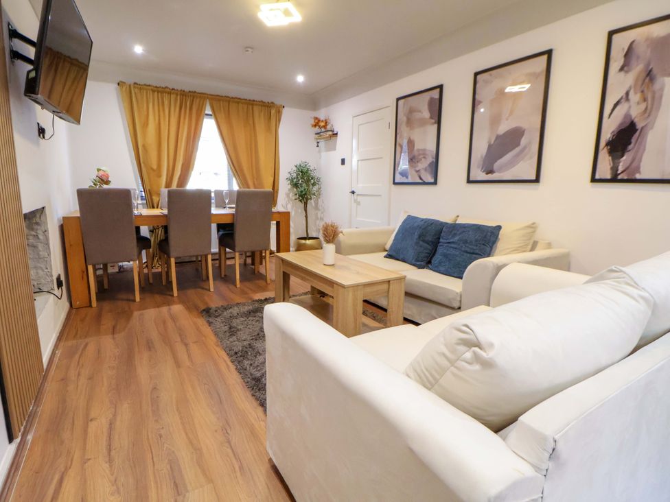 A living room with dining area and furniture at The Cloud House @ Hoole in Chester